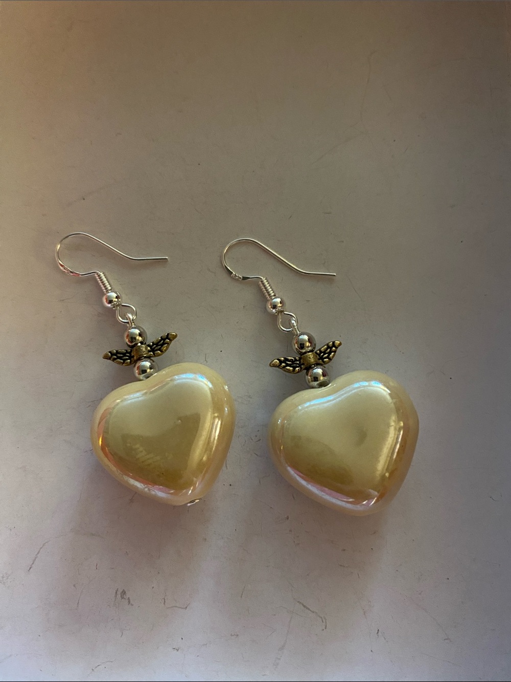 Good Vibes Only Pearl Heart Drop Earrings in Cream with Silver Accents!